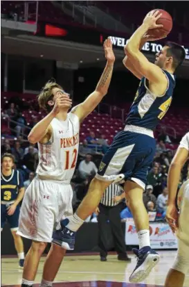  ?? PETE BANNAN — DIGITAL FIRST MEDIA ?? Wissahicko­n’s Zach Reiner puts up a shot as Penncrest’s Chris Mills defends.