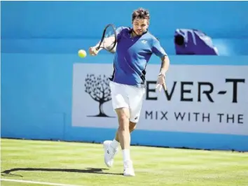  ?? AP ?? Lockerer Sieg in der 1. Runde: Stan Wawrinka ist die Umstellung von Sand auf Rasen gelungen.