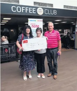  ??  ?? Cheque this Ian and Mary Grant present a cheque to Collette Thain of the PBC Foundation