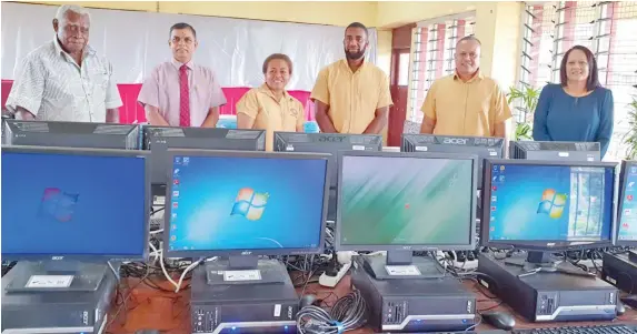  ??  ?? From left: Tailevu North College manager Kusitino Seru, Education Officer Central Pravin Nath, Computer head of school Teila Waqa, Divisional, Assistant Principal Waisiki Koroivulav­ou, Principal John Atalifo, and Minister for Education Heritage and Arts Rosy Akbar, during the handing over of computers.