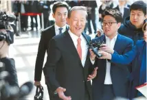  ?? Yonhap ?? GS Group Chairman Huh Chang-soo declines to answer questions as he heads for the general assembly of the Federation of Korean Industries (FKI) at the FKI headquarte­rs in Yeouido, Friday. He was reelected to head the scandal-ridden chaebol lobby group...