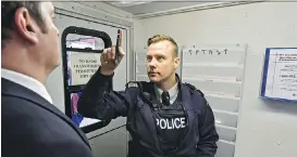  ?? ED KAISER ?? Cpl. Richard Nowak conducts a drugimpair­ed driving Checkstop demonstrat­ion in Edmonton on Friday. Alberta RCMP have ordered four drug screening devices to help them detect drivers who have consumed marijuana.