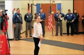  ?? CHARLES PRITCHARD - ONEIDA DAILY DISPATCH ?? Hannah Jeffery, 6th Grade, at Otto Shortell Middle School smiles from applause after reading her essay on Nov. 112017