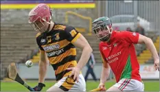  ??  ?? Michael Redmond (Rathnure) chased by James Peare (Rapparees) in their Pettitt’s SHC quarter-final in Innovate Wexford Park on Saturday.