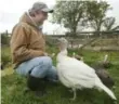  ??  ?? Farmer Denis Grignon raises only six turkeys at a time, but will have up to 70 meat chickens.