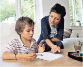  ??  ?? School’s out: Some parents will pay more than £1,500 a week for a residentia­l tutor to help with their child’s education throughout the summer holidays