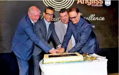  ?? ?? Celebrator­y cake cutting by Hon. John Pandazopou­los- The Board Chair, William Angliss Institute, Australia, Nicolas Hunt- Chief Executive Officer, William Angliss Institute, Australia, Errol Weerasingh­e - Chairman, Colombo Academy of Hospitalit­y Management (CAHM) and Professor Lalith Gamage - Vice Chancellor, Sri Lanka Institute of Informatio­n Technology.