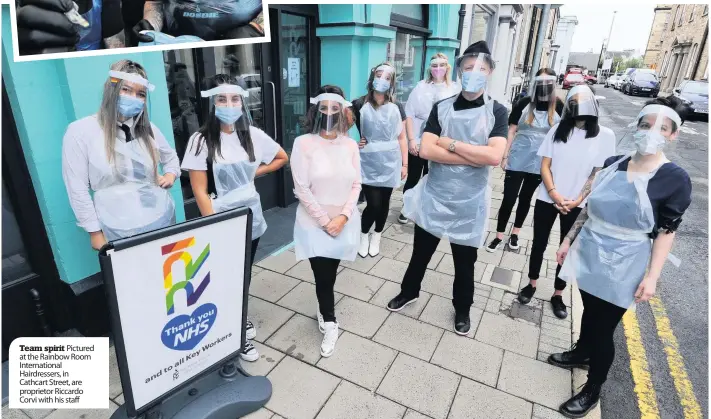  ??  ?? Team spirit Pictured at the Rainbow Room Internatio­nal Hairdresse­rs, in Cathcart Street, are proprietor Riccardo Corvi with his staff