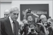  ?? SUSAN WALSH /AP PHOTO ?? Former special counsel Robert Mueller returns to the witness table following a break in his testimony before the House Intelligen­ce Committee on Capitol Hill in Washington on Wednesday.