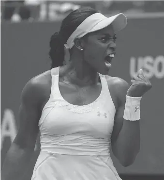  ?? TIMOTHY A. CLARY/AFP/GETTY IMAGES ?? Sloane Stephens celebrates a point against Anastasija Sevastova during their U.S. Open quarter-final in New York, Tuesday. The 24-year-old will face fellow American Venus Williams next.