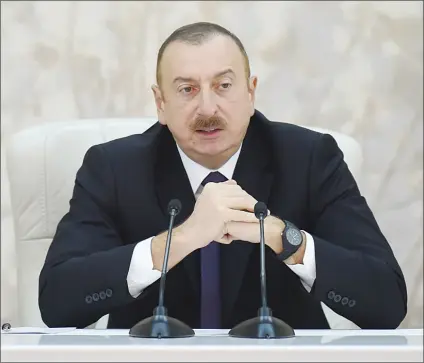  ??  ?? President Ilham Aliyev chaired a republican conference on the developmen­t of cotton-growing at the Culture Center in Barda region on March 26.