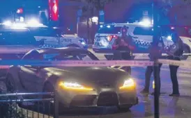  ?? TYLER PASCIAK LARIVIERE/SUN-TIMES ?? Chicago police at a shooting scene in River North on Sept. 3.