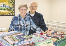  ?? LYNN CURWIN/TRURO NEWS ?? Jean and David Streifling have been making lap quilts for children who will be in the IWK on Christmas day. They plan to deliver about 40 of them to the hospital on Dec. 23.