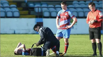  ??  ?? Sean Brennan is tended to during Saturday’s clash with Finn Harps.