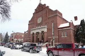  ?? AP Photo/Jim Mone ?? ■ Church of the Incarnatio­n is shown Jan. 23 in Minneapoli­s, where residents could pick up coats, sweaters and frozen chicken. With attendance dwindling, historic urban churches built in the early to mid-20th century, are fulfilling their faith-based mission to serve their neighbors.