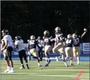  ?? ANDREW ROBINSON/MEDIANEWS GROUP ?? La Salle’s defense celebrates as Paul Jennings (47) scores on a fumble return against Archbishop Wood on Saturday.