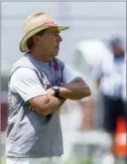  ?? VASHA HUNT/ALABAMA MEDIA GROUP VIA AP ?? Alabama coach Nick Saban watches his offensive players during practice at Bryant-Denny Stadium in Tuscaloosa, Ala. The Crimson Tide are No. 1 in the Associated Press Top 25 preseason poll for the second straight year.