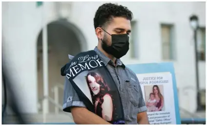  ?? Jason Armond/Los Angeles Times/REX/Shuttersto­ck ?? Oscar Rodriguez, brother of 18-year-old Mona Rodriguez, who was shot by a Long Beach Unified School District safety officer. Photograph: