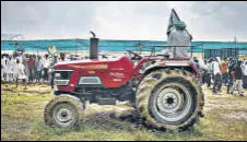  ?? REUTERS ?? A farmer sits on a tractor as he attends a mahapancha­yat in Uttar Pradesh’s Muzaffarna­gar earlier this month.