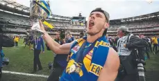  ??  ?? Norm Smith medallist Luke Shuey celebrates.