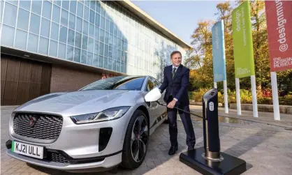  ?? Photograph: Department for Transport/PA ?? Grant Shapps visiting the Design Museum in London, unveils the new car charging point designed by the Royal College of Art.
