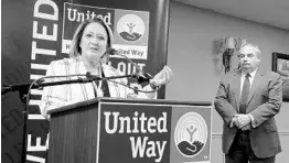  ?? JOE BURBANK/ORLANDO SENTINEL ?? Orange County Mayor Teresa Jacobs, left, with Heart of Florida United Way President & CEO Jeff Hayward, delivers remarks Thursday during the announceme­nt of a new housing program to assist victims of Hurricane Maria.