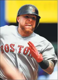  ?? Orlin Wagner / Associated Press ?? Boston Red Sox’s Christian Vazquez runs the bases during the seventh inning against the Kansas City Royals at Kauffman Stadium in Kansas City, Mo., on Thursday. Vazquez hit a two-run triple on the play.