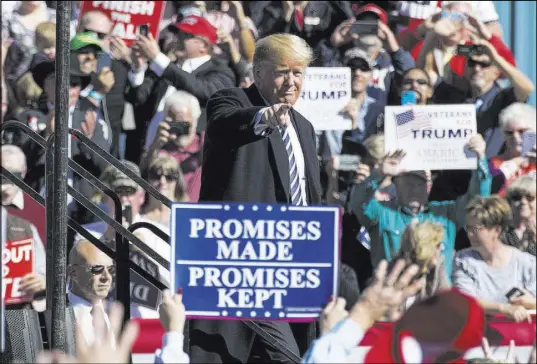  ?? Richard Brian Las Vegas Review-Journal @vegasphoto­graph ?? President Donald Trump acknowledg­es the crowd Saturday in Elko at a rally for GOP candidates.