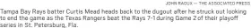  ?? JOHN RAOUX — THE ASSOCIATED PRESS ?? Tampa Bay Rays batter Curtis Mead heads back to the dugout after he struck out looking to end the game as the Texas Rangers beat the Rays 7-1 during Game 2 of their playoff series in St. Petersburg, Fla.
