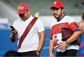  ??  ?? In hot water: Megat (right) is currently under suspension from all hockey activities.