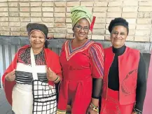  ?? Picture: GILLIAN McAINSH ?? LADIES IN RED: Guests, from left, Evelien Ntsetha, Ntuthu Ncoyo and Xola Jacobs enjoyed Thrive Women’s Month Conference, held by the Department of Sport, Recreation, Arts and Culture in partnershi­p with Vision4 Women at Bayworld last Saturday