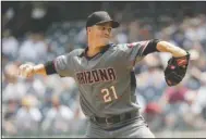  ?? The Associated Press ?? HOUSTON BOUND: Arizona Diamondbac­ks’ Zack Greinke delivers a pitch during the first inning of Wednesday’s game against the New York Yankees in New York.