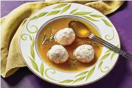  ?? Photos by Stacy Zarin Goldberg / For the Washington Post ?? Not-Quite Matzoh Ball Soup is made with ground chicken and almond flour.