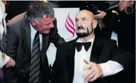  ?? VINCENZO D’ALTO/POSTMEDIA NEWS ?? Quebec Sports Hall of Fame inductees Marc Tardif and Maurice (Mad Dog) Vachon chat at a gala at the Casino in Montreal, in 2009. Vachon died Thursday at age 84.