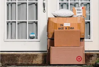  ?? Matt Slocum/Associated Press ?? While a federal law has not advanced, Texas and other states have new laws with stringent penalties on porch piracy. Retailers and delivery companies also are trying to stop thefts.
