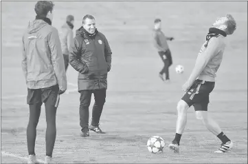  ??  ?? file photo shows Celtic manager brendan rodgers and stuart armstrong during training. — reuters photo