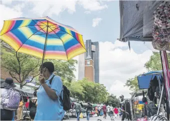  ?? Picture: Bloomberg ?? DEVELOPMEN­T DILEMMA. South Africa’s youthful army of unemployed millions has waited 23 years for ‘prosperity for all’. So far, pavements have provided more promise than politician­s.