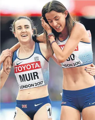 ??  ?? Laura Muir celebrates her 1500m final qualificat­ion with fellow-Brit Jessica Judd.