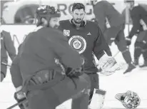  ?? POSTMEDIA NEWS ?? Goaltender Connor Hellebuyck is pictured during Winnipeg Jets practice in Winnipeg on Tuesday.