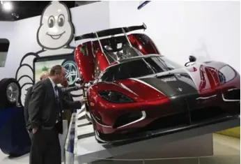  ?? CARLOS OSORIO/THE ASSOCIATED PRESS ?? Koenigsegg Automotive’s cars retail for well over $1 million — but there aren’t many of them.