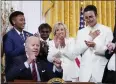  ?? PATRICK SEMANSKY — AP ?? President Joe Biden celebrates after signing an executive order at an event to celebrate Pride Month at the White House on Wednesday.