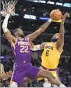  ?? Jae C. Hong Associated Press ?? LeBRON JAMES, right, and Lakers couldn’t put together a winning effort against Suns.