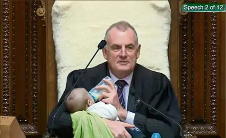  ?? — Reuters ?? Family matters: A screenshot showing Mallard feeding a Member of Parliament’s baby during a parliament­ary session in Wellington.