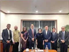  ?? NBC ?? NBC governor Chea Serey (centre right) meets with Internatio­nal Payments Limited (NIPL) in Mumbai, India, on February 16.