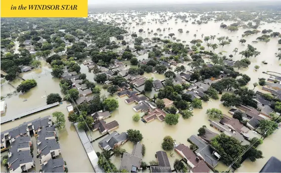  ?? DAVID J. PHILLIP / THE ASSOCIATED PRESS ?? Neighbourh­oods in Houston sit underwater as a record-breaking 125 centimetre­s of rain fell from Tropical Storm Harvey as of early Tuesday.