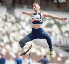  ?? — AFP ?? Maya Nakanishi competes in the women’s long jump — T64 category during a para-athletics test event.