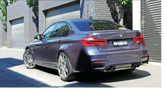  ??  ?? LEFT Carbon fibre roof lowers centre of gravity, looks great and gives AMG owners a moment of crushing inferiorit­y.
BELOW This 30 Jahre just drips in sexy details, from the illuminate­d M-logos in the seats to that fondlesome carbon strut brace.