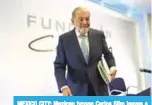  ??  ?? MEXICO CITY: Mexican tycoon Carlos Slim leaves a press conference in Mexico City yesterday.