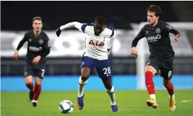  ??  ?? Tanguy Ndombele carried the ball away from Brentford’s Mathias Jensen during Tottenhaam’s Carabao Cup semi-final victory. Photograph: Tottenham Hotspur FC/Getty Images