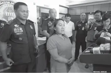  ?? PHILSTAR.COM ?? Agnes Tuballes, the recruiter of slain overseas Filipino worker Joanna Demafelis, is presented to the media at Camp Crame after she surrendere­d yesterday.